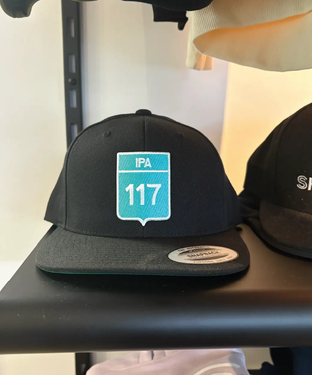 une casquette avec la classique IPA 117 de Shawbridge